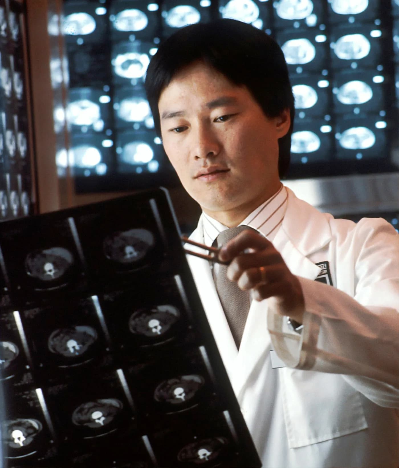 Healthcare professional preparing a blood sample collection kit